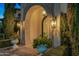 Ornate entryway with arched entry and wrought iron doors at 6800 E Caballo Dr, Paradise Valley, AZ 85253