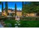 Stunning home exterior featuring a charming courtyard entry at 6800 E Caballo Dr, Paradise Valley, AZ 85253