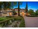 Mediterranean home with a grand entrance and manicured landscaping at 6800 E Caballo Dr, Paradise Valley, AZ 85253