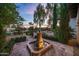 Charming courtyard fountain and landscaping at the entrance at 6800 E Caballo Dr, Paradise Valley, AZ 85253