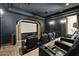 This home theater boasts a large screen and luxury seating for an immersive entertainment experience at 6800 E Caballo Dr, Paradise Valley, AZ 85253