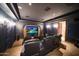State-of-the-art home theater with comfortable seating and large screen at 6800 E Caballo Dr, Paradise Valley, AZ 85253