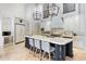 Gourmet kitchen boasts expansive island, high-end appliances, and custom cabinetry at 6800 E Caballo Dr, Paradise Valley, AZ 85253