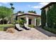 Relaxing patio area with lounge chairs and lush landscaping at 6800 E Caballo Dr, Paradise Valley, AZ 85253