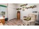 Relaxing bedroom with a recliner, desk, and decorative shelves at 7819 E Dallas St, Mesa, AZ 85207