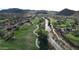 Aerial view of community with golf course and residential homes at 8829 S 51St St # 3, Phoenix, AZ 85044