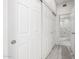 Bathroom with marble shower, vanity, and a large closet at 8829 S 51St St # 3, Phoenix, AZ 85044