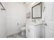 Updated bathroom with white vanity and gray tile floor at 8829 S 51St St # 3, Phoenix, AZ 85044