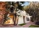 Charming two-story home featuring mature landscaping and a well-maintained front yard at 8829 S 51St St # 3, Phoenix, AZ 85044