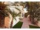 Charming home featuring manicured landscaping, brick pathway, and well-maintained exterior at 8829 S 51St St # 3, Phoenix, AZ 85044