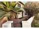 Charming two-story home featuring mature landscaping, and a well-maintained front yard at 8829 S 51St St # 3, Phoenix, AZ 85044
