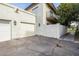 Attached two-car garage with stucco exterior at 8829 S 51St St # 3, Phoenix, AZ 85044