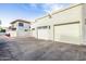 Two-car garage with private driveway and stucco exterior at 8829 S 51St St # 3, Phoenix, AZ 85044