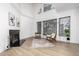 Bright living room with fireplace and high ceilings at 8829 S 51St St # 3, Phoenix, AZ 85044