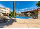 Community pool with surrounding patio and lounge chairs at 8829 S 51St St # 3, Phoenix, AZ 85044