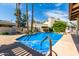 Sparkling community pool with tiled accents and stairs at 8829 S 51St St # 3, Phoenix, AZ 85044