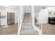 Modern staircase with light gray carpeting at 8829 S 51St St # 3, Phoenix, AZ 85044