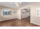 Spacious bedroom with wood-look tile flooring and ceiling fan at 10012 W Sandstone Dr, Sun City, AZ 85351