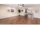 Bright living room with hardwood floors and ceiling fan at 10012 W Sandstone Dr, Sun City, AZ 85351