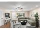 Virtually staged living room with modern furniture at 10012 W Sandstone Dr, Sun City, AZ 85351