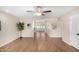 Bright living room with hardwood floors and ceiling fan at 10012 W Sandstone Dr, Sun City, AZ 85351