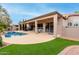 Inviting backyard oasis with a sparkling pool and spa at 10035 E Diamond Dr, Sun Lakes, AZ 85248