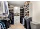 Large walk-in closet with ample shelving and hanging space at 10035 E Diamond Dr, Sun Lakes, AZ 85248