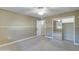 Well-lit bedroom with carpet and ceiling fan at 10252 N 105Th Dr, Sun City, AZ 85351