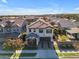 Two-story house with a two-car garage and landscaped yard at 10307 E Nopal Ave, Mesa, AZ 85209