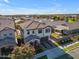 Two-story house with a two-car garage and landscaped yard at 10307 E Nopal Ave, Mesa, AZ 85209