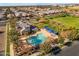 Aerial view of community pool, clubhouse, and sports courts at 10307 E Nopal Ave, Mesa, AZ 85209