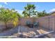 Cozy patio with fire pit and seating area, perfect for outdoor entertaining at 10307 E Nopal Ave, Mesa, AZ 85209