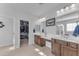 Bathroom with double vanity, large mirror, and walk-in shower at 10307 E Nopal Ave, Mesa, AZ 85209