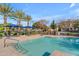 Inviting community pool with lounge chairs and umbrellas at 10307 E Nopal Ave, Mesa, AZ 85209