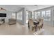 Bright dining area with table and chairs near sliding glass doors at 10307 E Nopal Ave, Mesa, AZ 85209