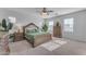 Large main bedroom with wood furniture and ceiling fan at 10307 E Nopal Ave, Mesa, AZ 85209