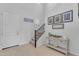 Elegant staircase with iron railing and decorative console table at 10307 E Nopal Ave, Mesa, AZ 85209