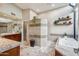 Main bathroom with soaking tub, double vanity, and walk-in shower at 10489 N 99Th St, Scottsdale, AZ 85258