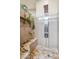 Elegant bathroom with a walk-in shower and built-in bench at 10489 N 99Th St, Scottsdale, AZ 85258