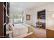 Spacious bedroom with built-in shelves and window seating at 10489 N 99Th St, Scottsdale, AZ 85258