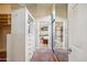 Large walk-in closet with built-in drawers and shelving at 10489 N 99Th St, Scottsdale, AZ 85258