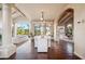 Elegant dining area with hardwood floors and large windows at 10489 N 99Th St, Scottsdale, AZ 85258