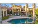 Inviting pool and patio area with lush landscaping at 10489 N 99Th St, Scottsdale, AZ 85258