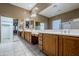 Double vanity bathroom with large mirror and walk-in shower at 1060 W Silver Creek Rd, Gilbert, AZ 85233