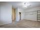 Spacious bedroom with double closets and built-in shelving at 1060 W Silver Creek Rd, Gilbert, AZ 85233