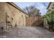 Home exterior showcasing a gated entry and utility area at 1060 W Silver Creek Rd, Gilbert, AZ 85233