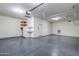 Large garage with ample storage and extra refrigerator at 1060 W Silver Creek Rd, Gilbert, AZ 85233