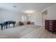 Bright living room with tiled floors and ample natural light at 1060 W Silver Creek Rd, Gilbert, AZ 85233