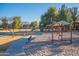 Community playground with swings and play structures at 1060 W Silver Creek Rd, Gilbert, AZ 85233