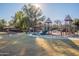 Modern playground with slides and climbing structures at 1060 W Silver Creek Rd, Gilbert, AZ 85233